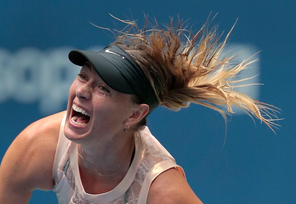 Maria Sharapova, of Russia, serves to Anastasija Sevastova, of Latvia, during the fourth round of the U.S. Open tennis tournament, Sunday, Sept. 3, 2017, in New York. (AP Photo/Andres Kudacki)