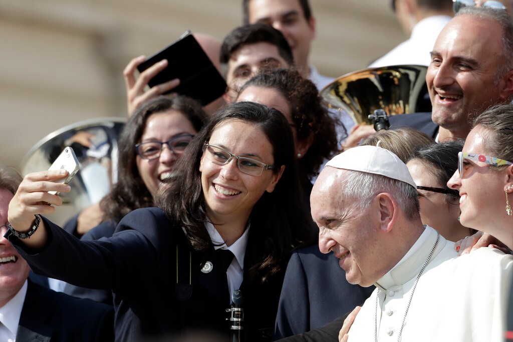 (AP Photo/Gregorio Borgia, file) In this Sept. 10, 2016, photo, Pope Francis poses for a selfie during a Jubilee audience in St. Peter's Square at the Vatican.