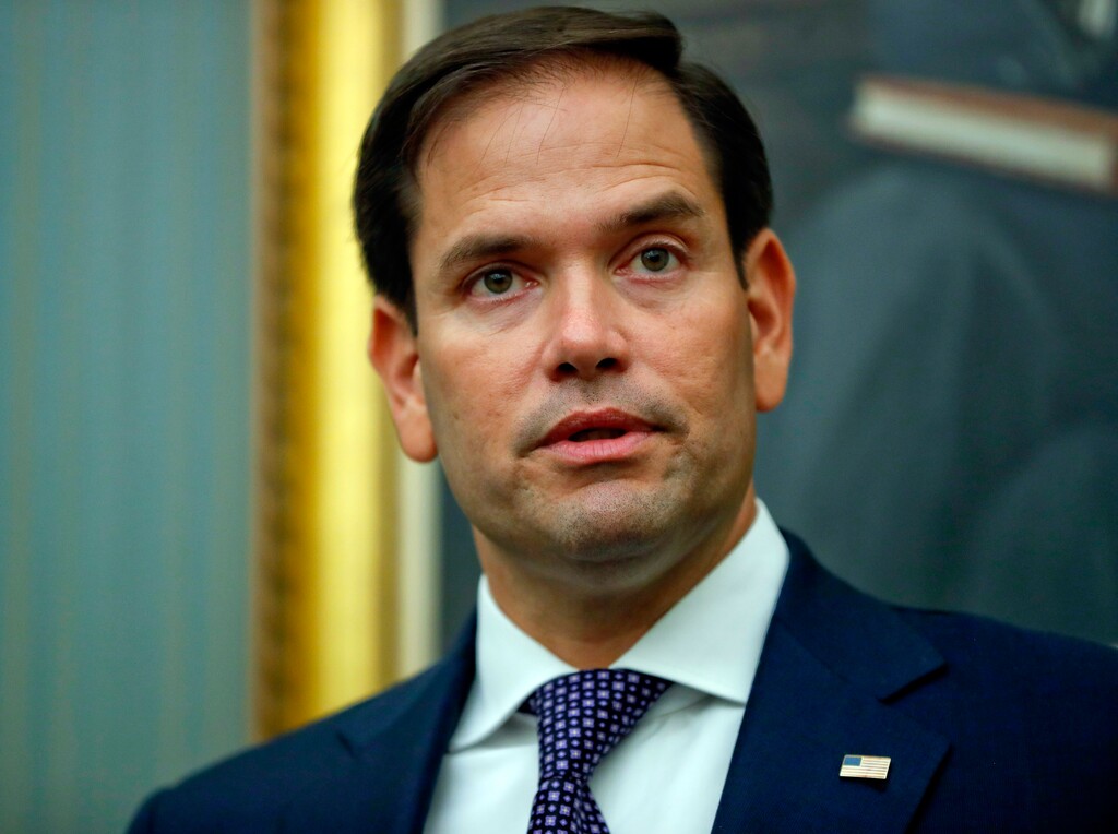 FILE - In this Sept. 26, 2017, file photo, Sen. Marco Rubio, R-Fla., speaks during a news conference on Capitol Hill in Washington. Rubio will vote for his party's $1.5 trillion tax bill. That gives a major boost to the prospects that GOP leaders will be able to push their prized measure through Congress next week. The Florida lawmaker had said he'd oppose the legislation unless his colleagues made the per child tax credit more generous for low-income families. On Dec. 15, Republicans said the final legislation would do just that. (AP Photo/Pablo Martinez Monsivais, File)