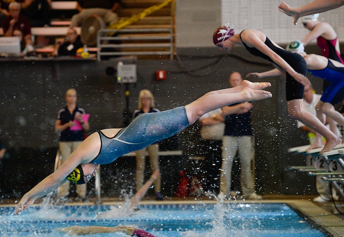 (Francisco Kjolseth | The Salt Lake Tribune) Women compete in the 200 Yard Medley Relay at the high school swimming 5A State Championships in Bountiful, Friday February 9, 2018.