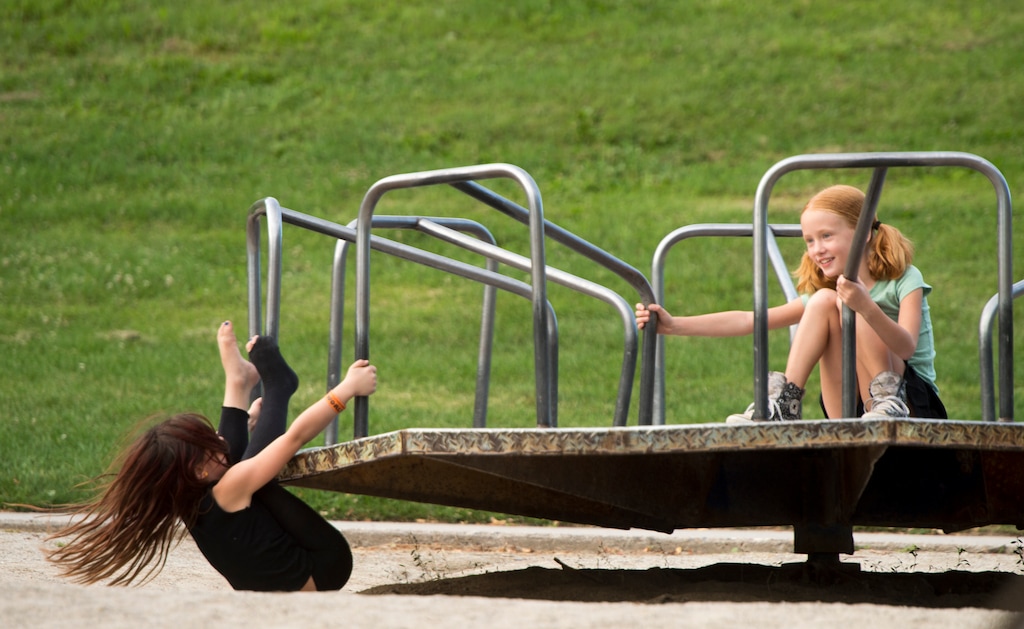(Rick Egan  |  The Salt Lake Tribune) Children play at Lindsey Gardens playground on July 19, 2015.