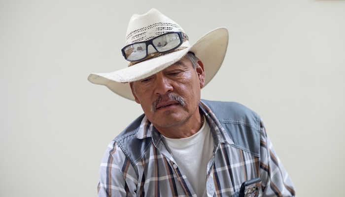 (Zack Wittman  |  For The Washington Post)  Santiago Velasco, a field shift manager, discusses the future of fruit picking on Wednesday, Feb. 6, 2019, at G & D Farms in Duette, Florida.