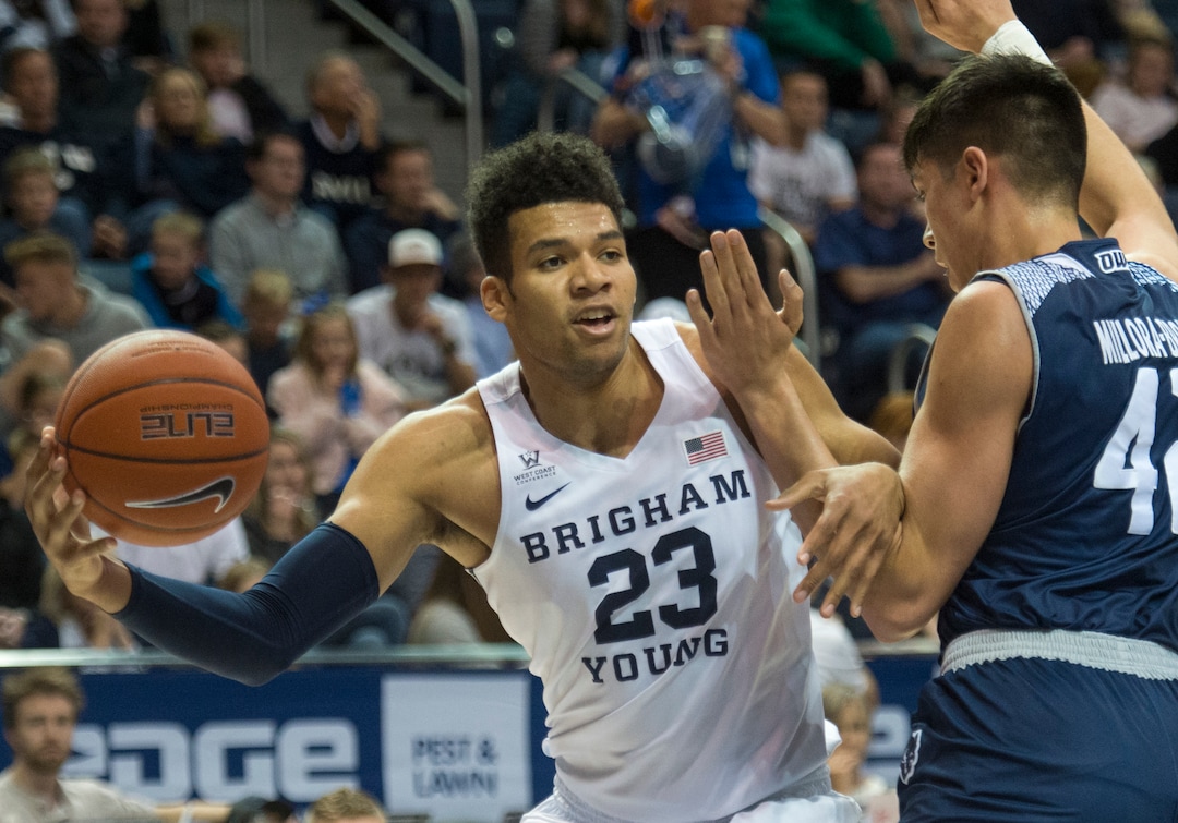 (Rick Egan  |  The Salt Lake Tribune)   Brigham Young Cougars forward Yoeli Childs (23) works for a shot, as Rice Owls forward Quentin Millora-Brown (42) defends, in basketball action between Brigham Young Cougars and Rice Owls, at the Marriott Center in Provo, Wednesday, Nov. 21, 2018.