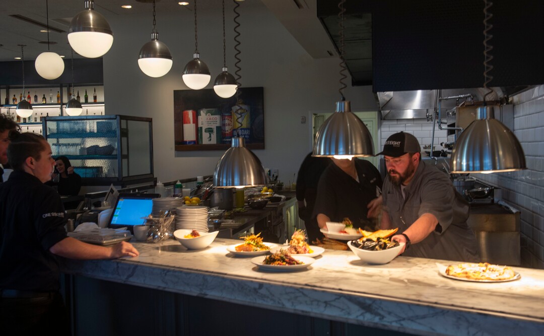 (Rick Egan  |  The Salt Lake Tribune)      The open kitchen at OneOEight, a new bistro on the corner of 1300 South and 1700 East in Salt Lake City,Thursday, March 7, 2019.