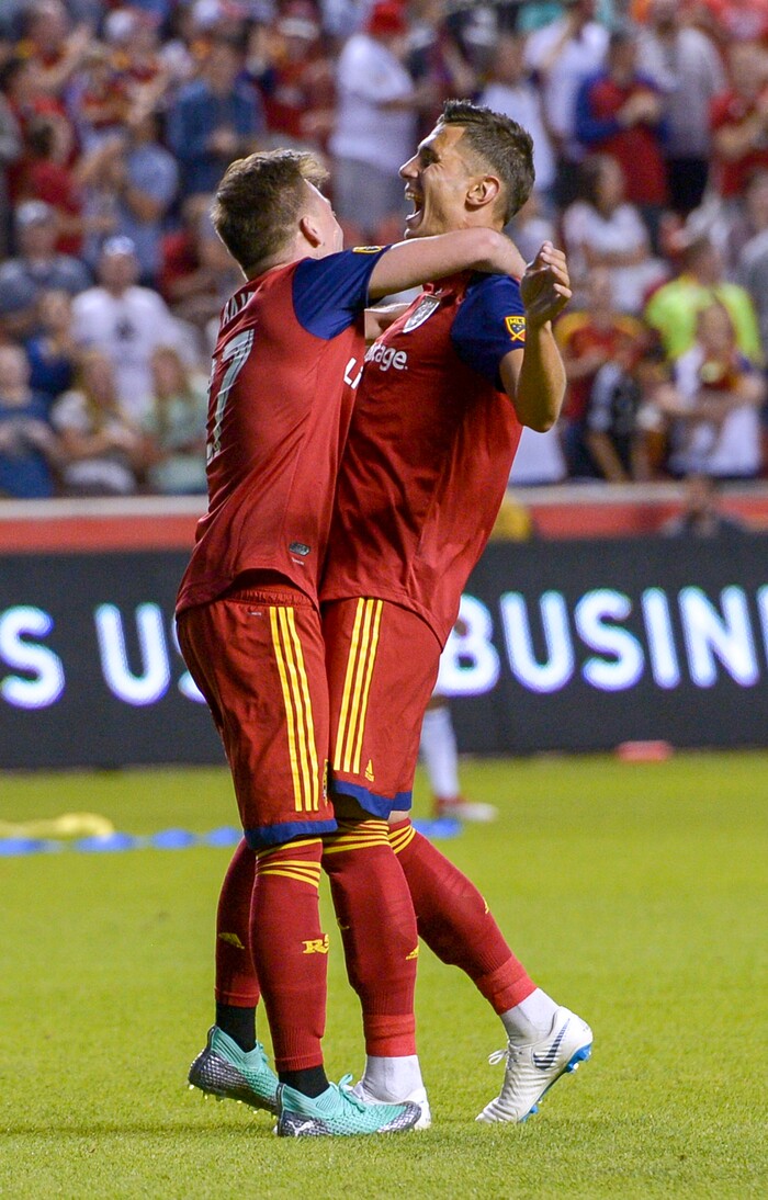 Leah Hogsten | The Salt Lake Tribune Real Salt Lake forward Corey Baird (27) celebrates teammate Real Salt Lake midfielder Damir Kreilach's (6) goal as Real Salt Lake hosts the San Jose Earthquakes at Rio Tinto Stadium in Sandy, Utah, Saturday, June 23, 2018.