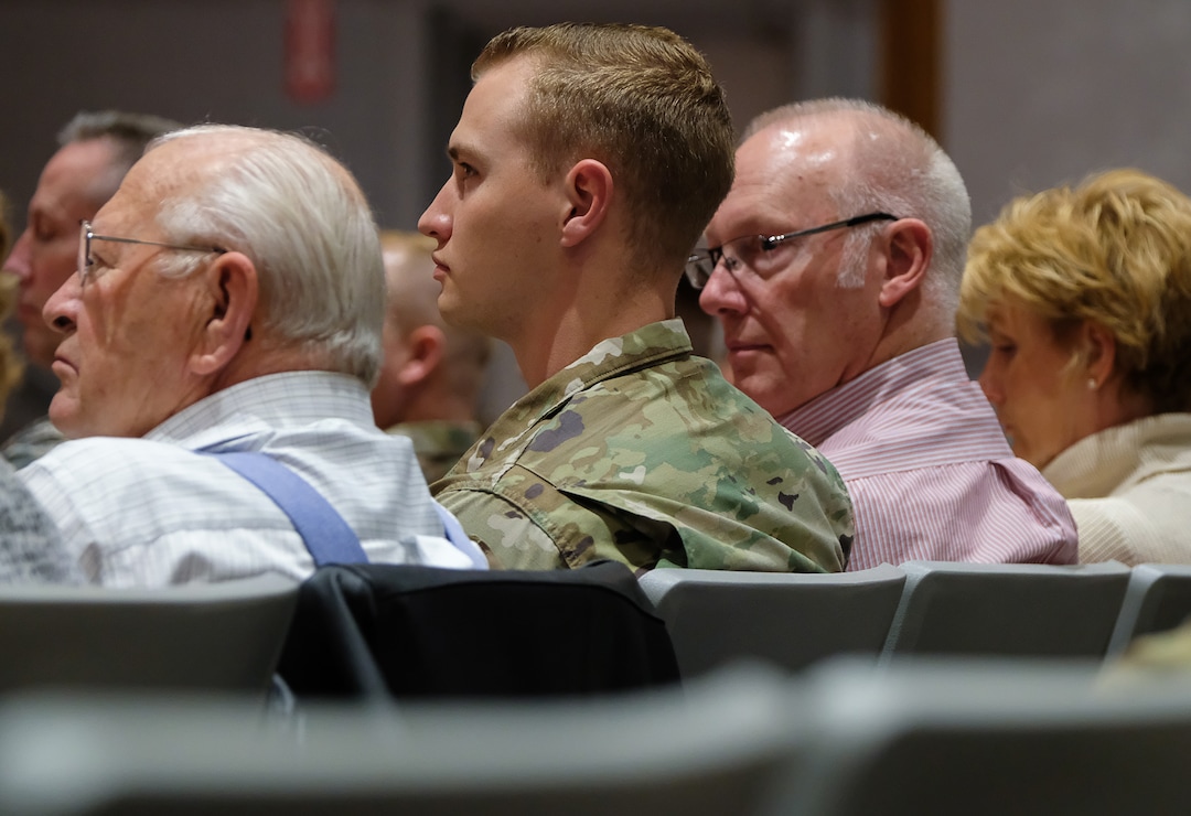 (Francisco Kjolseth  |  The Salt Lake Tribune)  Charles Larson, right, looks at his son, Specialist Chad Larson during departure ceremonies for the 141st Military Intelligence Battalion at the Utah National Guard headquarters in Draper on Monday, March 19, 2018. At left is Chad's grandfather Ron Maughan as families hold a heartfelt goodbye before a tour departing on a tour Kuwait.  