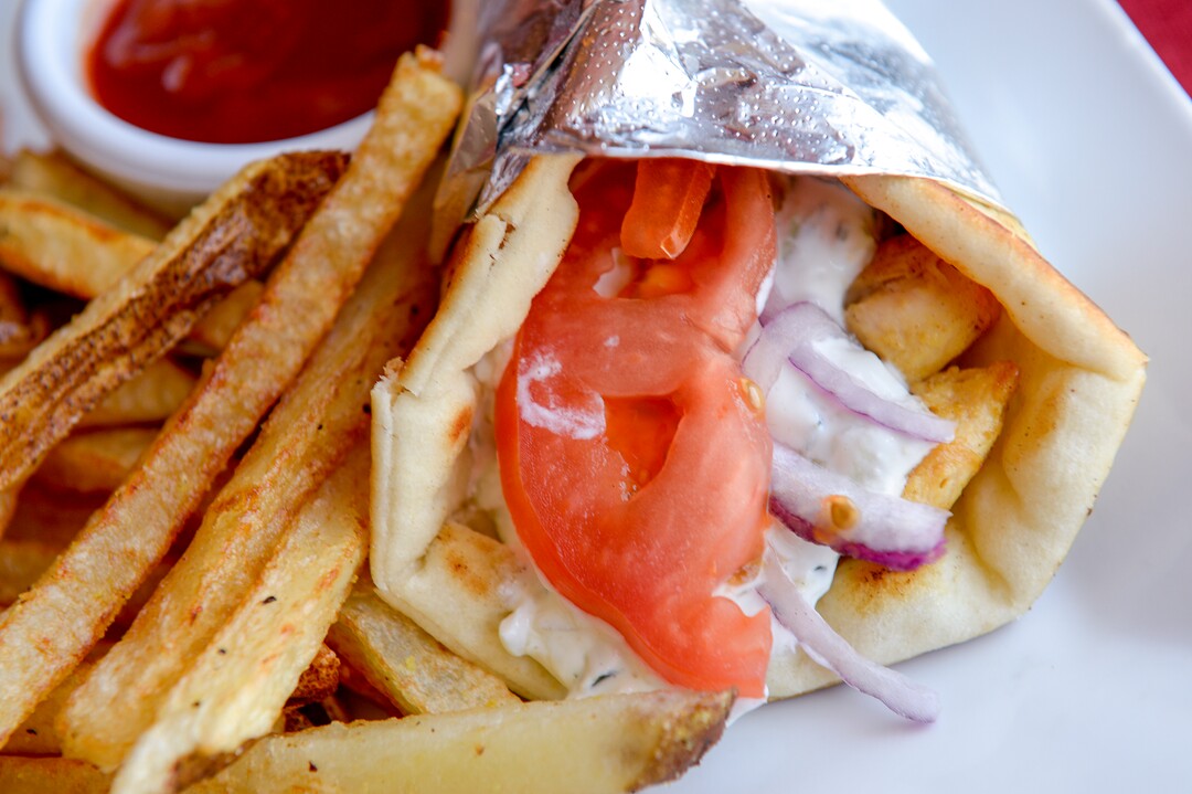 (Leah Hogsten  |  The Salt Lake Tribune) Chicken Shawarma made with grilled chicken breast with special seasonings, wrapped in a pita bread with tomato, onion and zatziki at Pasha Middle Eastern Cuisine, $12. Pasha Middle Eastern Cuisine specializes in a fusion of Moroccan, Mediteranean and Middle Eastern dishes, Aug. 14, 2019.