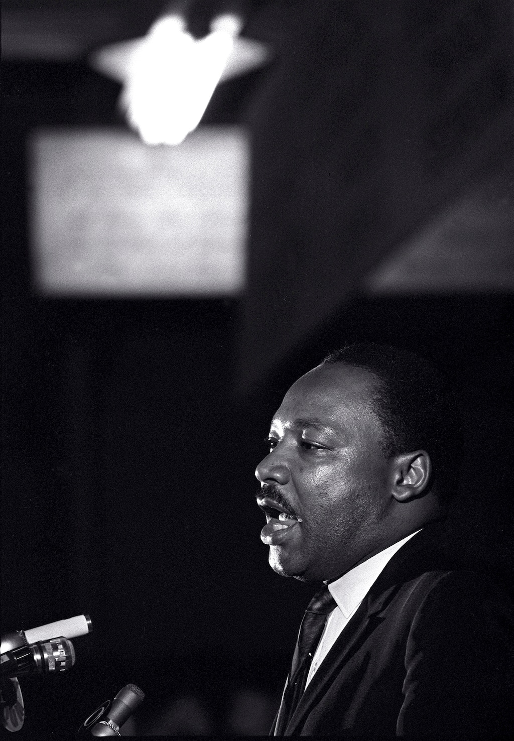 (AP Photo/Charles Kelly, File) In this April 3, 1968, file photo, Martin Luther King Jr. makes his last public appearance at the Mason Temple in Memphis, Tenn. The next day, King was assassinated on his motel balcony.