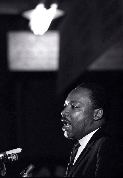 (AP Photo/Charles Kelly, File) In this April 3, 1968, file photo, Martin Luther King Jr. makes his last public appearance at the Mason Temple in Memphis, Tenn. The next day, King was assassinated on his motel balcony.