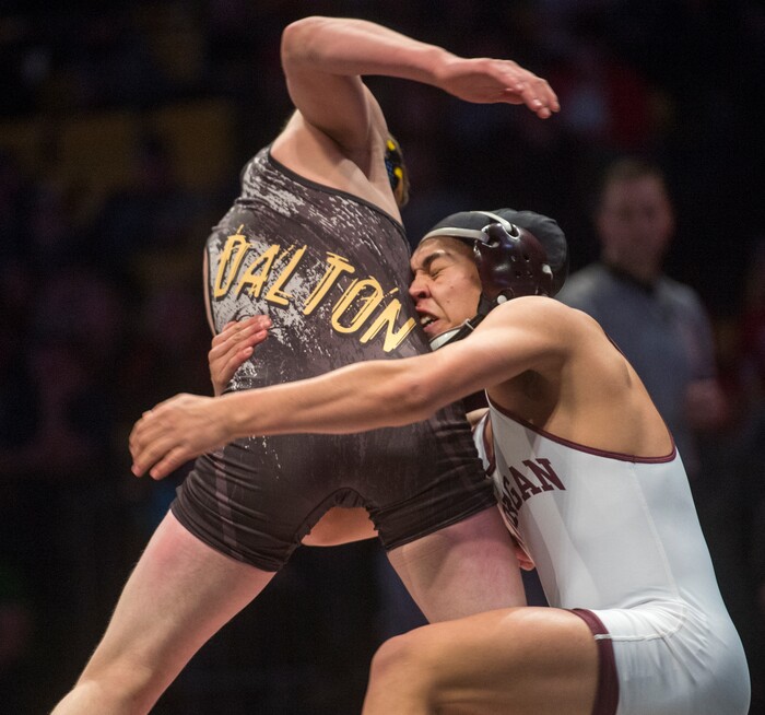 (Rick Egan  |  The Salt Lake Tribune)   Antonio Nava (Morgan) wrestles Agustus Dalton (Emery).  Nava won the match in the 152 weight class (Dec 8-5) in the 3A State Wrestling at UVU in Orem, Saturday, February 10, 2018.
