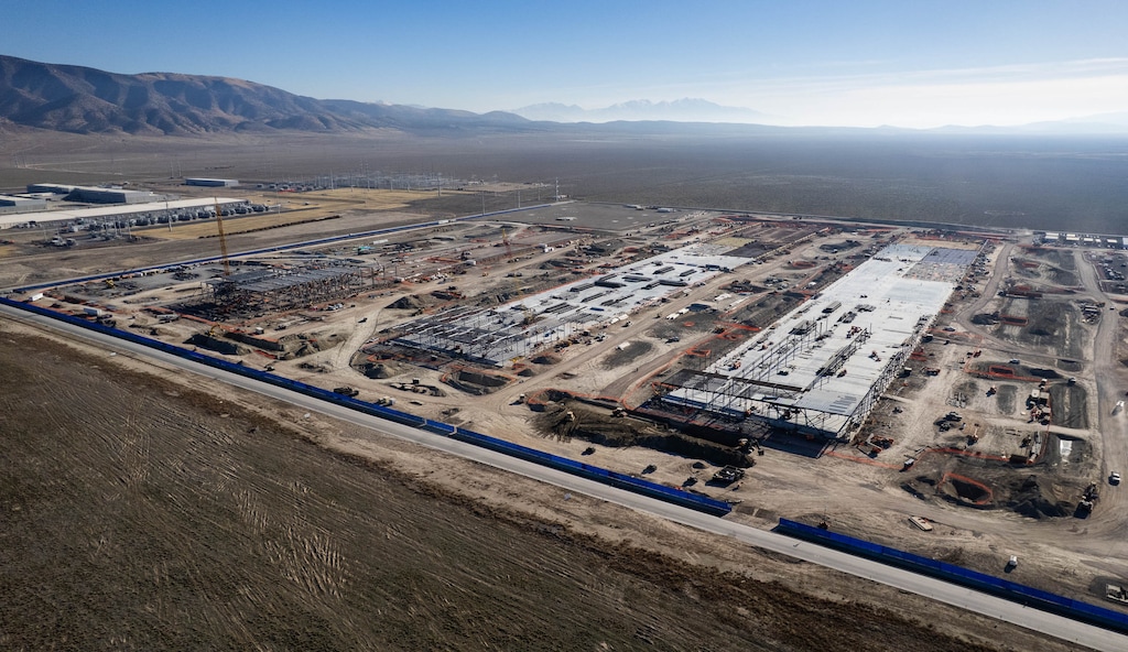 (Francisco Kjolseth | The Salt Lake Tribune) A data center, being built by QTS, begins to take shape west to the Meta facility in Eagle Mountain on Tuesday, Dec. 30, 2025.