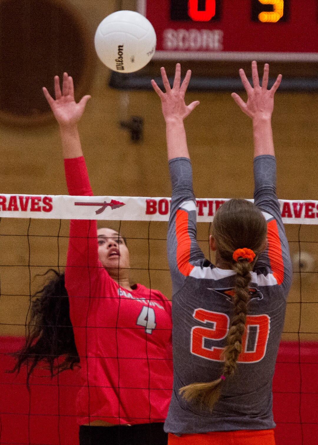(Rick Egan  |  The Salt Lake Tribune)  Brook Pe'a hits the ball for Bountiful,  as Kenadee Christensen (20) defends for Skyridge, in volleyball action, Bountiful vs. Skyridge, at Bountiful High, Wednesday, September 6, 2017.