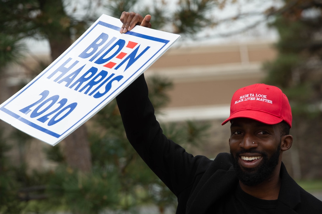 (Francisco Kjolseth  |  The Salt Lake Tribune) Blair Jones joins supporters of President-elect Joe Biden as they celebrate at Liberty Park on Saturday, Nov. 7, 2020, in Salt Lake City.