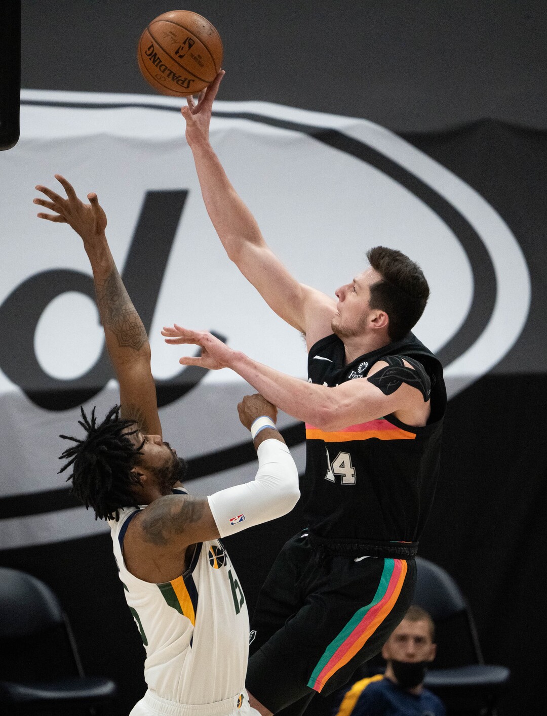 (Francisco Kjolseth | The Salt Lake Tribune) Utah Jazz center Derrick Favors (15) tries to block San Antonio Spurs forward Drew Eubanks (14) in NBA action between the Utah Jazz and the San Antonio Spurs at Vivint Smart Home Arena, on Wednesday, May 5, 2021.