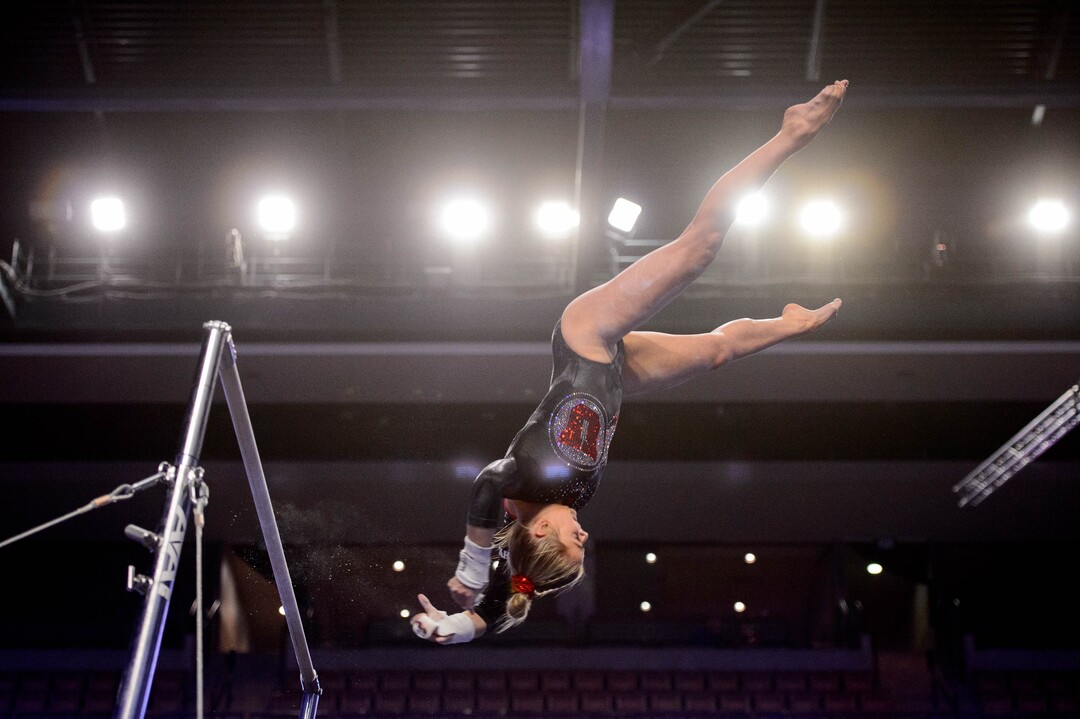 (Trent Nelson  |  The Salt Lake Tribune) Utah's Hunter Dula on the bars at the Best of Utah NCAA Gymnastics Meet in West Valley City on Saturday, Jan. 11, 2020.