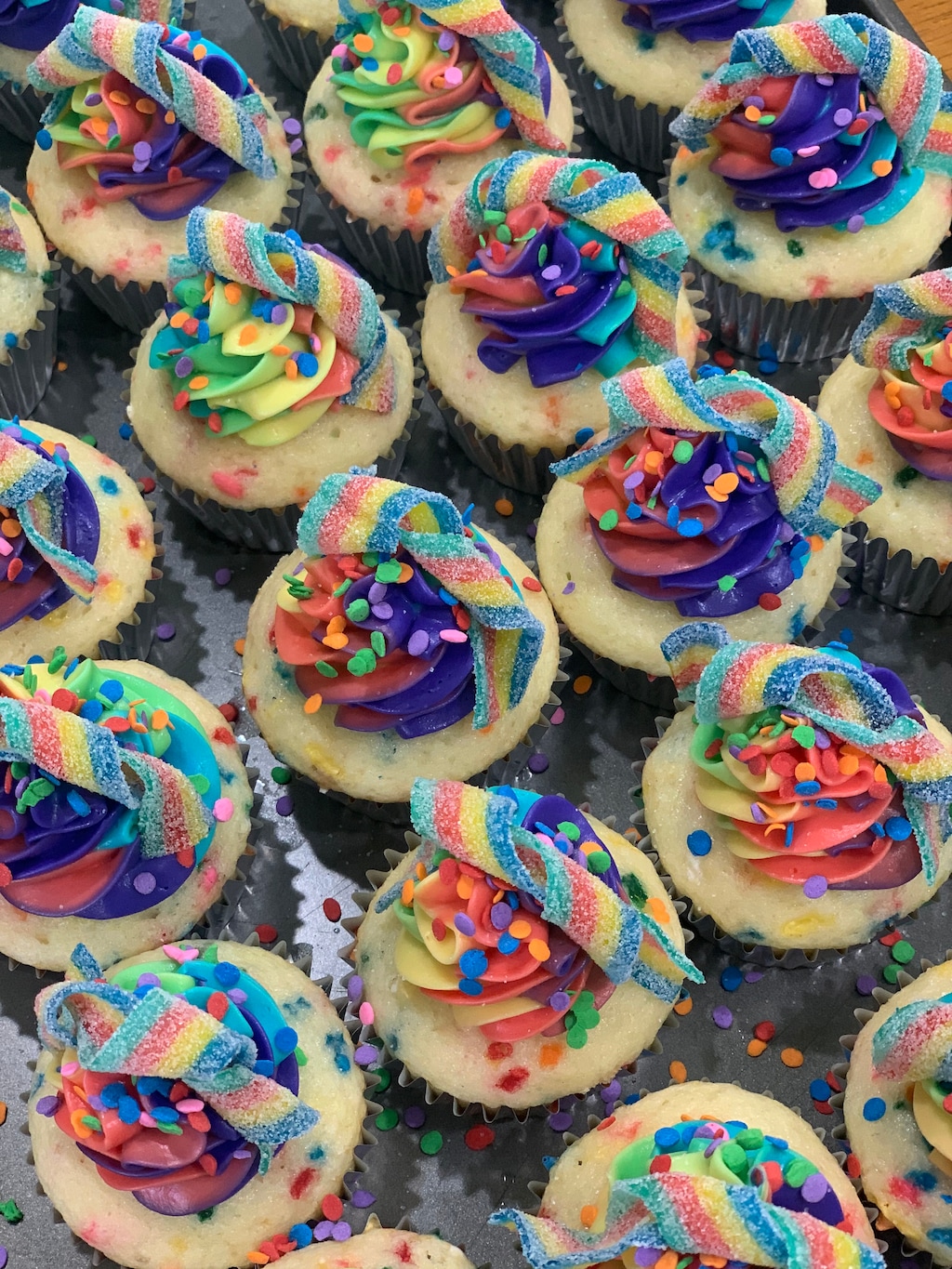 (Courtesy of Melissa Diaz) Rainbow cupcakes from Sweet Vinyl Bakeshop. Owner Melissa Diaz made the vanilla cupcakes with Double White Rainbow, an India Pale Ale from Red Rock Brewing, to be served at the launch of the double dry-hopped beer.