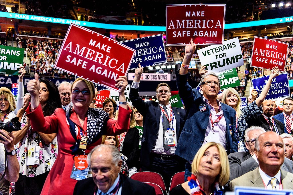 (Trent Nelson | Tribune file photo) Utah delegates wave signs and enjoy the show at the 2016 Republican National Convention in Cleveland, July 18, 2016. There is talk of having some of the national party conventions conducted entirely or in part online as a COVID-19 precaution. Party leaders and some delegates interviewed hope it doesn't come to that.