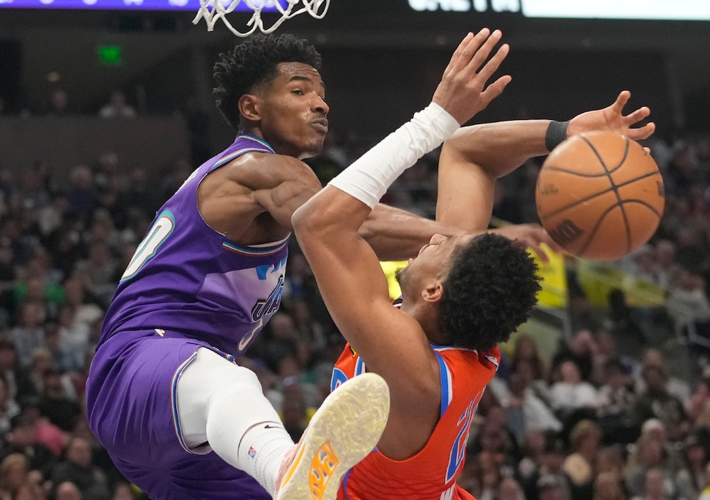 (Leah Hogsten | The Salt Lake Tribune) Utah Jazz guard Ochai Agbaji (30) denies Oklahoma City Thunder guard Aaron Wiggins (21) at the net as the Utah Jazz host the Oklahoma Thunder at Vivint Arena Thursday, April 6, 2023.