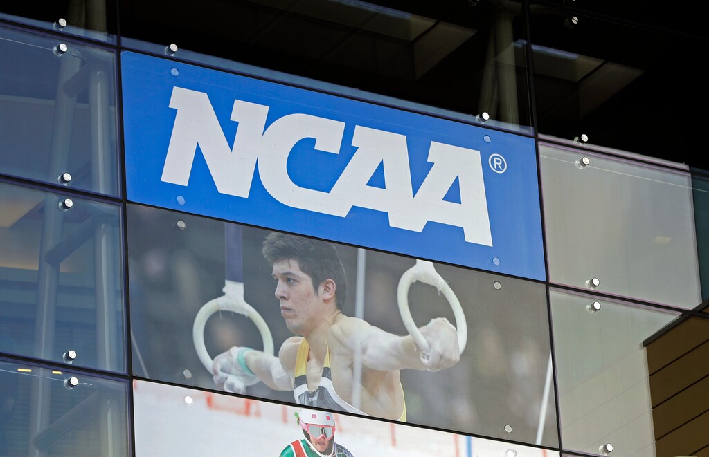 (Darron Cummings | AP) The NCAA took another step toward passing name, image and likeness (NIL) rules that will allow college athletes to prosper off their personas.