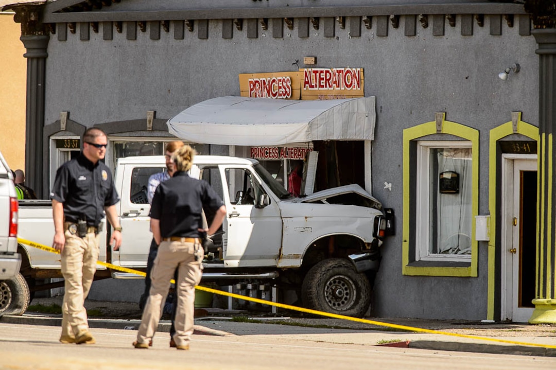(Trent Nelson  |  The Salt Lake Tribune)  Law enforcement at the scene of a shootout near 3300 South State Street in South Salt Lake on Monday April 8, 2019.