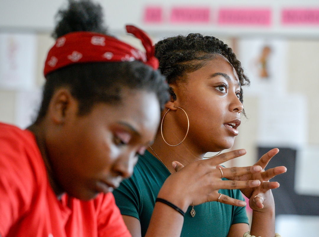 (Leah Hogsten  |  The Salt Lake Tribune) Liliane Kwizera, left, and Summer Goodin, right, join in the discussion during East High School's Black Student Union meeting Sept. 18.