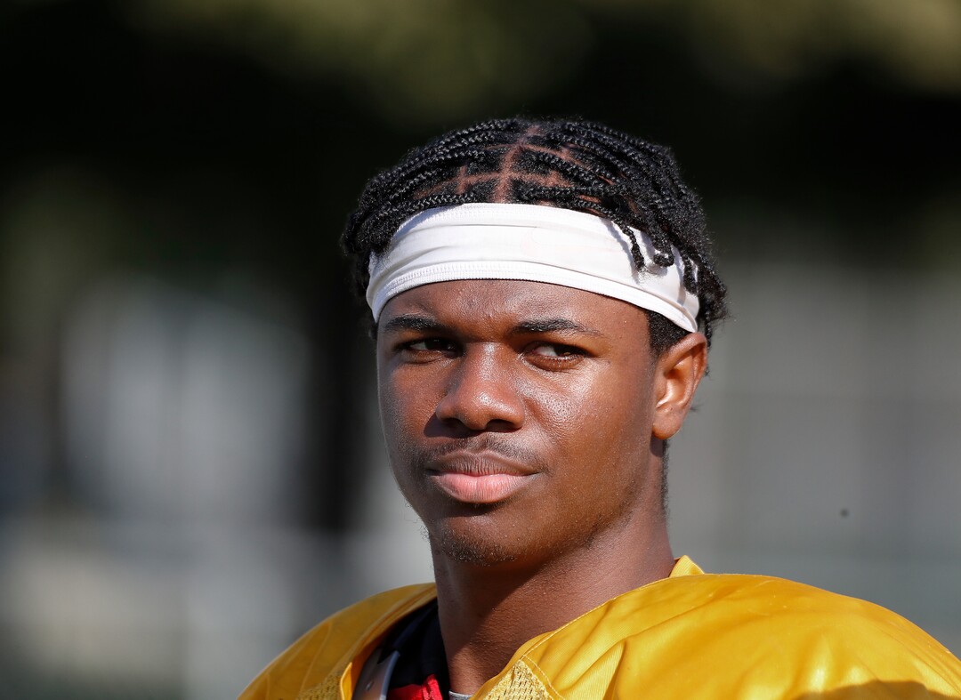 (Gary Kazanjian | Special to The Tribune) Clovis High School quarterback Nate Johnson works out with his team at Clovis High School, who committed to play for the University of Utah, shown Wednesday, July 28, 2021, in Clovis, Calif.