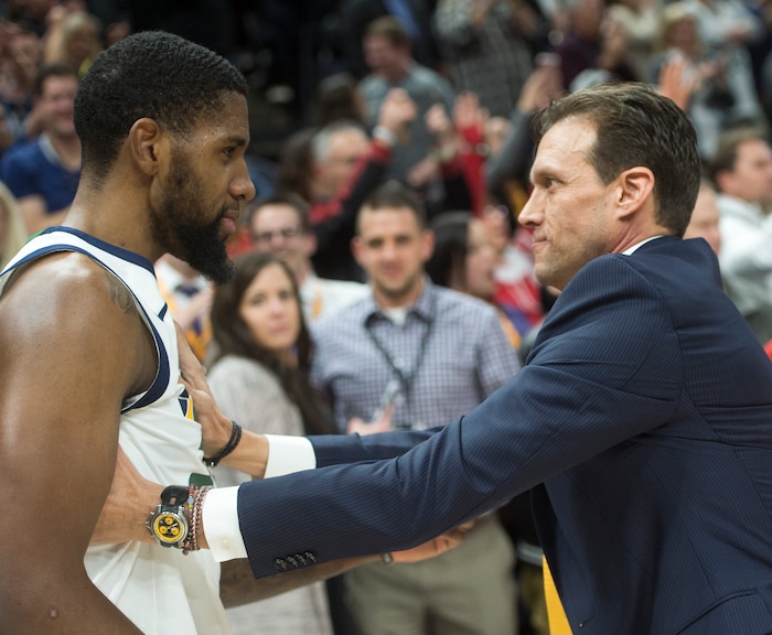 (Rick Egan  |  The Salt Lake Tribune)  Utah Jazz forward Royce O'Neale (23) gets a hug from Utah Jazz head coach Quin Snyder, as theJazz defeat the Spurs 101-99 for their 10th win in a row, in NBA action in Salt Lake City, Monday, February 12, 2018.