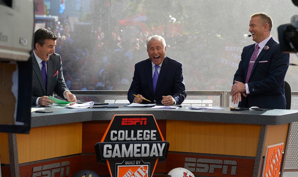 Leah Hogsten  |  The Salt Lake Tribune
ESPN's "College GameDay," cast Rece Davis, L, Lee Corso, C, and Kirk Herbstreit, R, share a laugh during a past broadcast at the University of Utah. The trio, along with Desmond Howard, landed in Conway, S.C. Saturday to put their huge college football spotlight on Saturday's BYU-Coastal Carolina game.