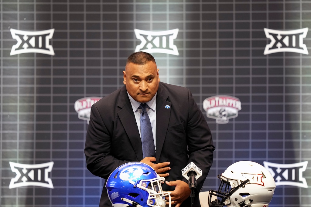 (LM Otero | AP) BYU coach Kalani Sitake sits before speaking at the Big 12 college football media days in Arlington, Texas, Wednesday, July 12, 2023.