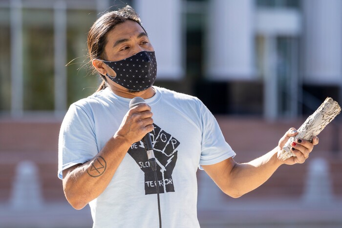 (Rick Egan | The Salt Lake Tribune) Carl Moore speaks during a rally demanding an end to the policy of violence and terror inflicted on our unsheltered community at the hands of the Salt Lake County Health Department, Salt Lake City, and Salt Lake City Police Department, at Washington Square, on Friday, April 2, 2021.