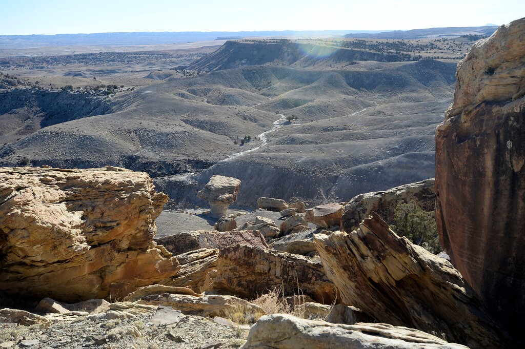 (Al Hartmann | Tribune file photo) Molen Reef, pictured here in Utah's Emery County, is filled with Fremont rock art in a rugged landscape the Bureau of Land Managements offered for oil and gas development in 2018. These leases are among the 130 the BLM suspended in Utah last month so it could conduct additional environmental studies examining their potential climate impacts.