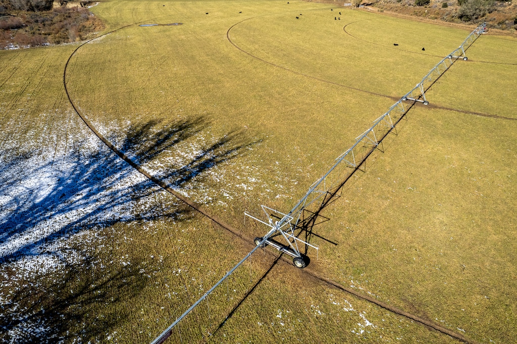 (Trent Nelson  |  The Salt Lake Tribune) Pivot irrigation on an alfalfa field in Mt. Carmel  on Thursday, Nov. 10, 2022.