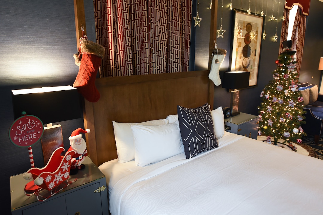 (Francisco Kjolseth  |  The Salt Lake Tribune)  The Christmas-themed suite on the 15th floor of the Hotel Monaco is decorated with lights, Christmas stockings and a tree. It's being offered in conjunction with The Miracle Bar.