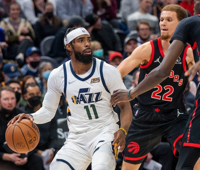 (Rick Egan | The Salt Lake Tribune)Utah Jazz guard Mike Conley (11) is guarded by Toronto Raptors guard Malachi Flynn (22), in NBA action between Utah Jazz and Toronto Raptors, at Vivint Arena, in Salt Lake City, on  Thursday, Nov. 18, 2021.