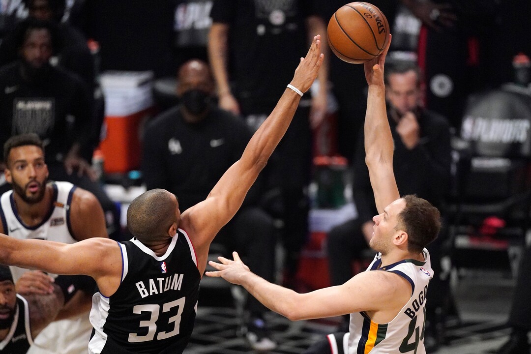 Utah Jazz forward Bojan Bogdanovic, right, shoots as LA Clippers forward Nicolas Batum defends during the second half of Game 3 of a second-round NBA basketball playoff series Saturday, June 12, 2021, in Los Angeles. (AP Photo/Mark J. Terrill)