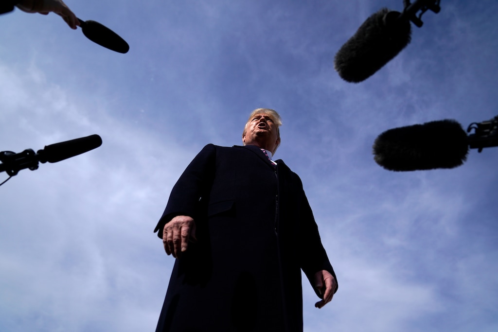 (Evan Vucci | AP) President Donald Trump talks to the media before he boards Air Force One for a trip to Los Angeles to attend a campaign fundraiser, Tuesday, Feb. 18, 2020, at Andrews Air Force Base, Md.