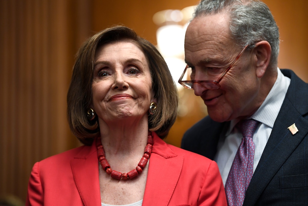 (Susan Walsh | AP file photo)  House Speaker Nancy Pelosi of Calif., left, and Senate Minority Leader Sen. Chuck Schumer of N.Y., right, listen as they wait to speak at an event on Capitol Hill in Washington, Tuesday, Nov. 12, 2019.
