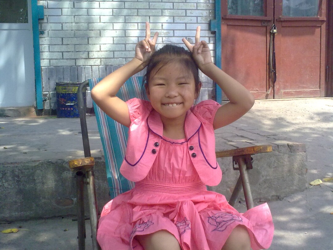 (Dong family) Pictured is Zhifan Dong as a kid. Her parents remember her being a light-hearted, sometimes silly young woman.