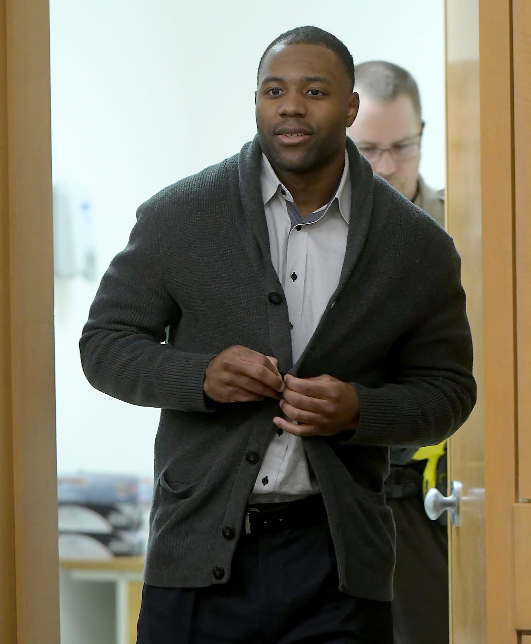 Torrey Green enters the courtroom to hear the juries verdict in his rape case, Friday, Jan. 18, 2019, in Brigham City, Utah. Green was found guilty of eight charges including five counts of rape and a charge sexual battery in connection to reports from six women accusing him of sexual assault while he was a football player at Utah State University, Friday, Jan.18, 2019 in Brigham City, Utah. (Eli Lucero/Herald Journal via AP)