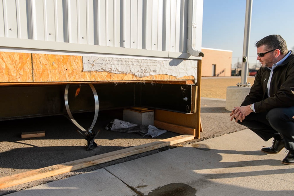 (Trent Nelson | The Salt Lake Tribune) Steve Hogan, Granite School District's director of planning and boundaries, shows the underside of a portable classroom at Stansbury Elementary School in West Valley City. On Wednesday, several Utah civil and architectural engineering groups called for more stringent building standards on the hundreds of portable classrooms in use across the state, saying current rules may be putting students at risk.