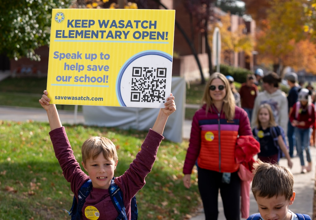 (Rick Egan | The Salt Lake Tribune) James Edwards walks with other students and parents from Wasatch Elementary up to Ensign Elementary school on Friday, Nov. 10, 2023.