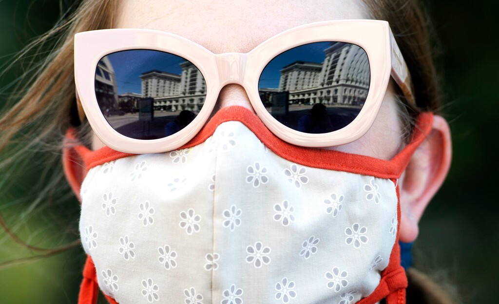 (Rick Egan  |  Tribune file photo)  A woman wears a mask in downtown Salt Lake City, on Wednesday, July 29, 2020.