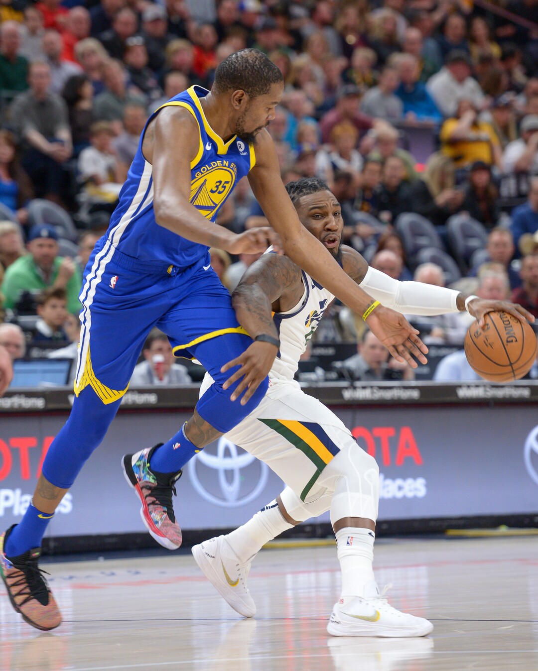(Leah Hogsten  |  The Salt Lake Tribune)  Golden State Warriors forward Kevin Durant (35) pressures Utah Jazz forward Jae Crowder (99). The Utah Jazz defeated the Golden State Warriors 119-79 during their game, Tuesday, April 10, 2018 at the Vivant Smart Home Arena. 