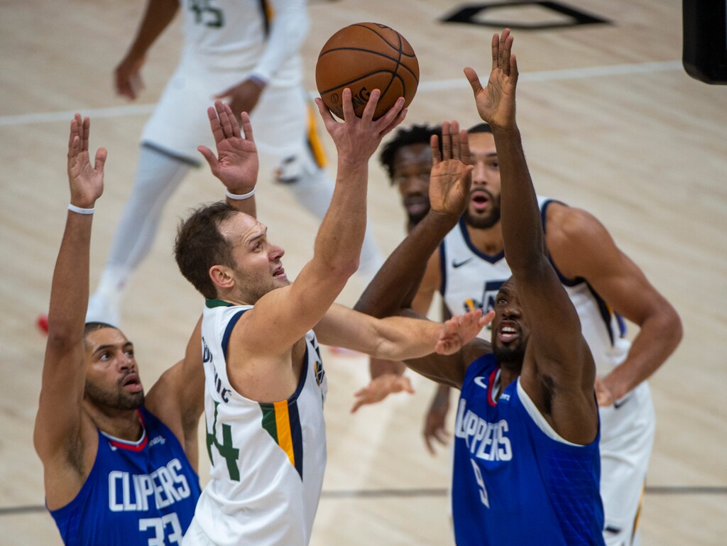 (Rick Egan | The Salt Lake Tribune) Utah Jazz forward Bojan Bogdanovic (44) takes the ball inside as LA Clippers forward Serge Ibaka (9) defends, in NBA action between the Utah Jazz and the LA Clippers at Vivint Arena, on Friday, Jan. 1, 2021.