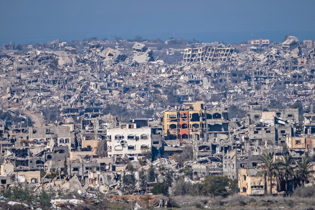Destroyed buildings are seen inside the Gaza Strip from southern Israel, Tuesday, Jan. 7, 2025. (AP Photo/Ariel Schalit)