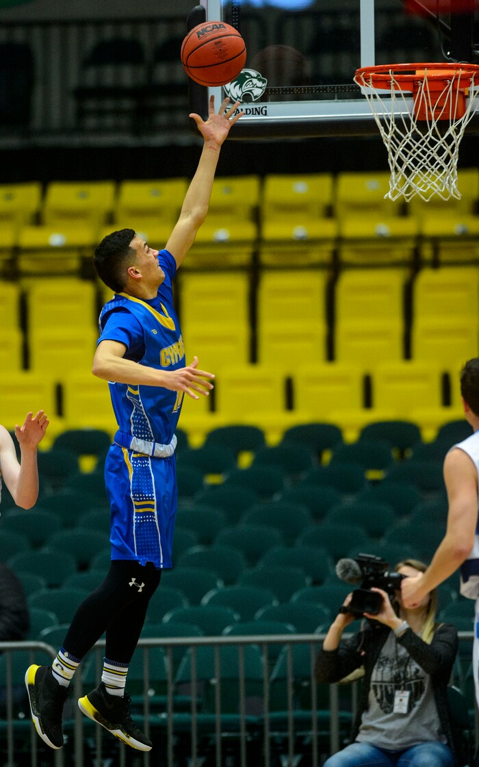 (Steve Griffin  |  The Salt Lake Tribune) Layton's Truman Brown gets free for a finger roll basket during 6A basketball playoff game against Layton at the Utah Valley UniversityÕs UCCU Center in Provo Tuesday Feb. 27, 2018.