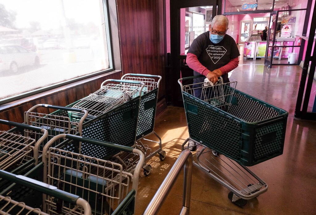 (Francisco Kjolseth | Tribune file photo) Manuel Garcia starts his shift cleaning grocery carts for customers as Rancho Markets implements numerous safety precautions at their stores to navigate the coronavirus pandemic as people shop at the 140 N. 900 West location in Salt Lake City on Friday, August 14, 2020.