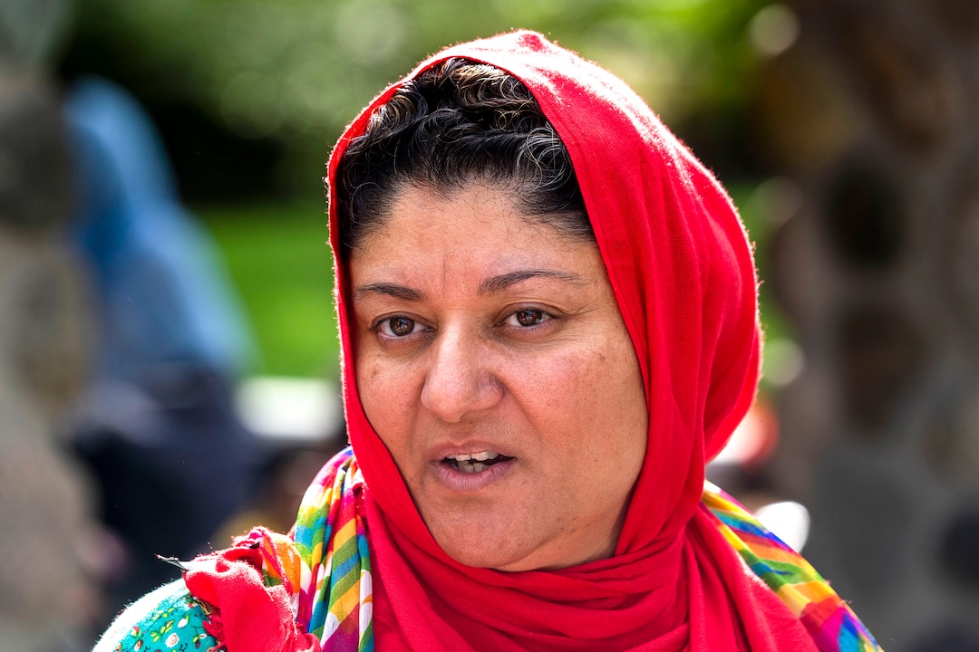 (Rick Egan | The Salt Lake Tribune) Shazia Aminzada talks about her relatives in Afghanistan, as she gathers at Murray Park for a prayer vigil in honor of UtahÕs Afghan refugees, onSaturday, Aug. 21, 2021.