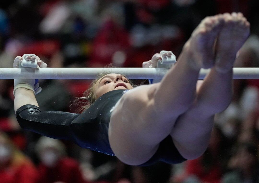 (Francisco Kjolseth | The Salt Lake Tribune) Utah’s Grace McCallum competes on bars during their gymnastics meet with Stanford at the Huntsman Center in Salt Lake City, Saturday, Jan. 29, 2022.