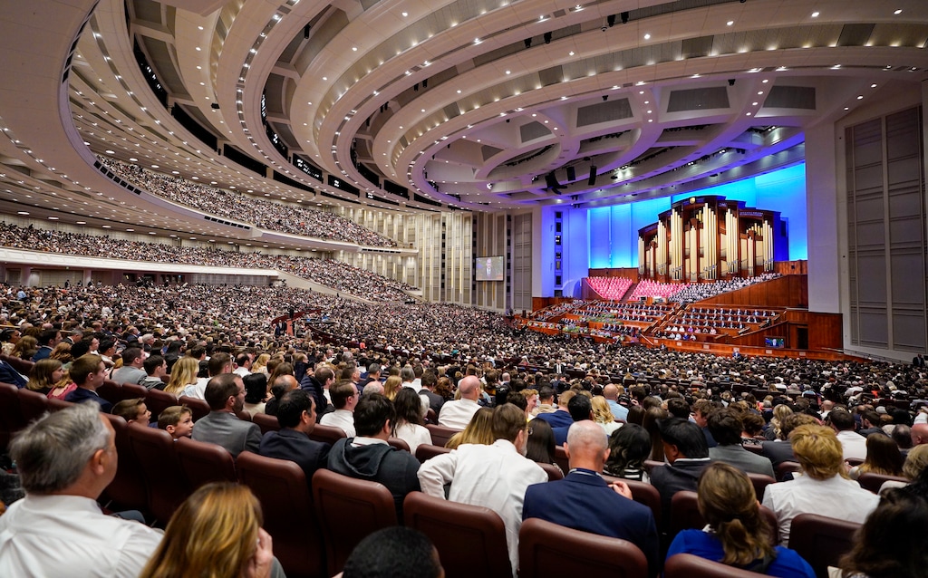 (Chris Samuels | The Salt Lake Tribune) Attendees watch General Conference of The Church of Jesus Christ of Latter-day Saints in April 2025. A Latter-day Saint tax law professor doubts the church will abandon its policy of political neutrality.